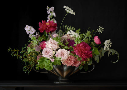 Limited Edition "Rose" Fine Art Photographic Print. Elegant Floral Arrangement of Roses and Peonies in a Antique Black Mantle Vase against a black background.